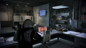 Первая консоль в самом начале до лифта, в доме справа.